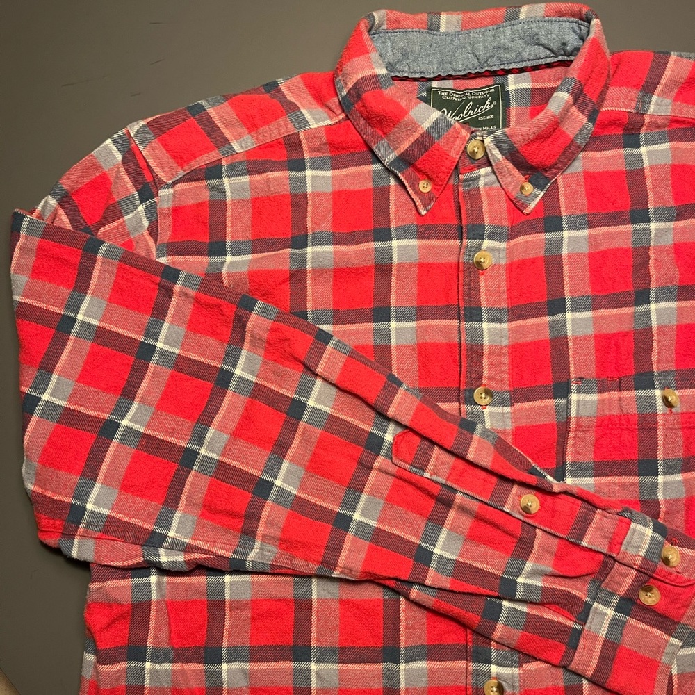 Woolrich red and blue plaid flannel. Size Large